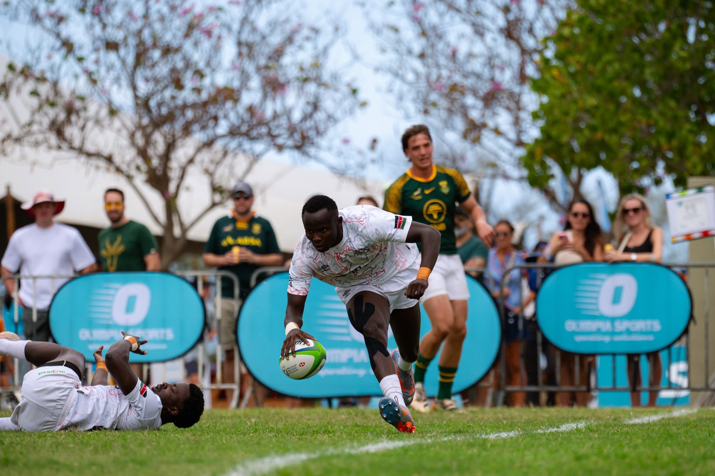 Kenya Shujaa player carries the ball during a rugby sevens match