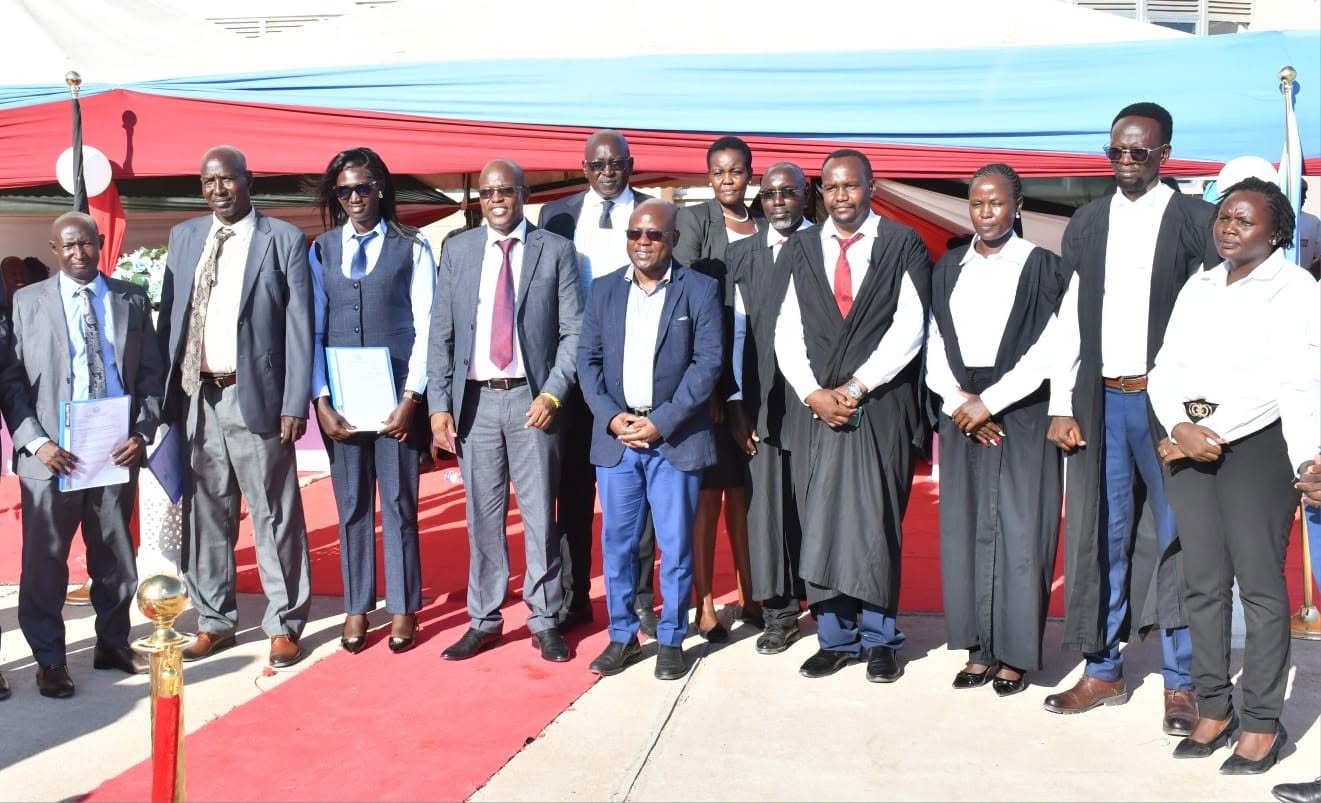 Newly appointed Turkana County Public Service Board officials pose for a group photograph after their swearing-in ceremony in Lodwar.