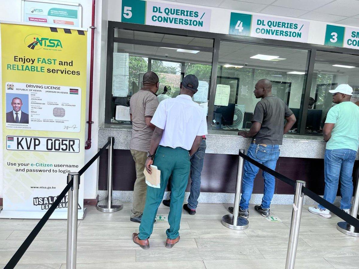 Motorists queue at an NTSA service centre to collect vehicle documents and number plates.