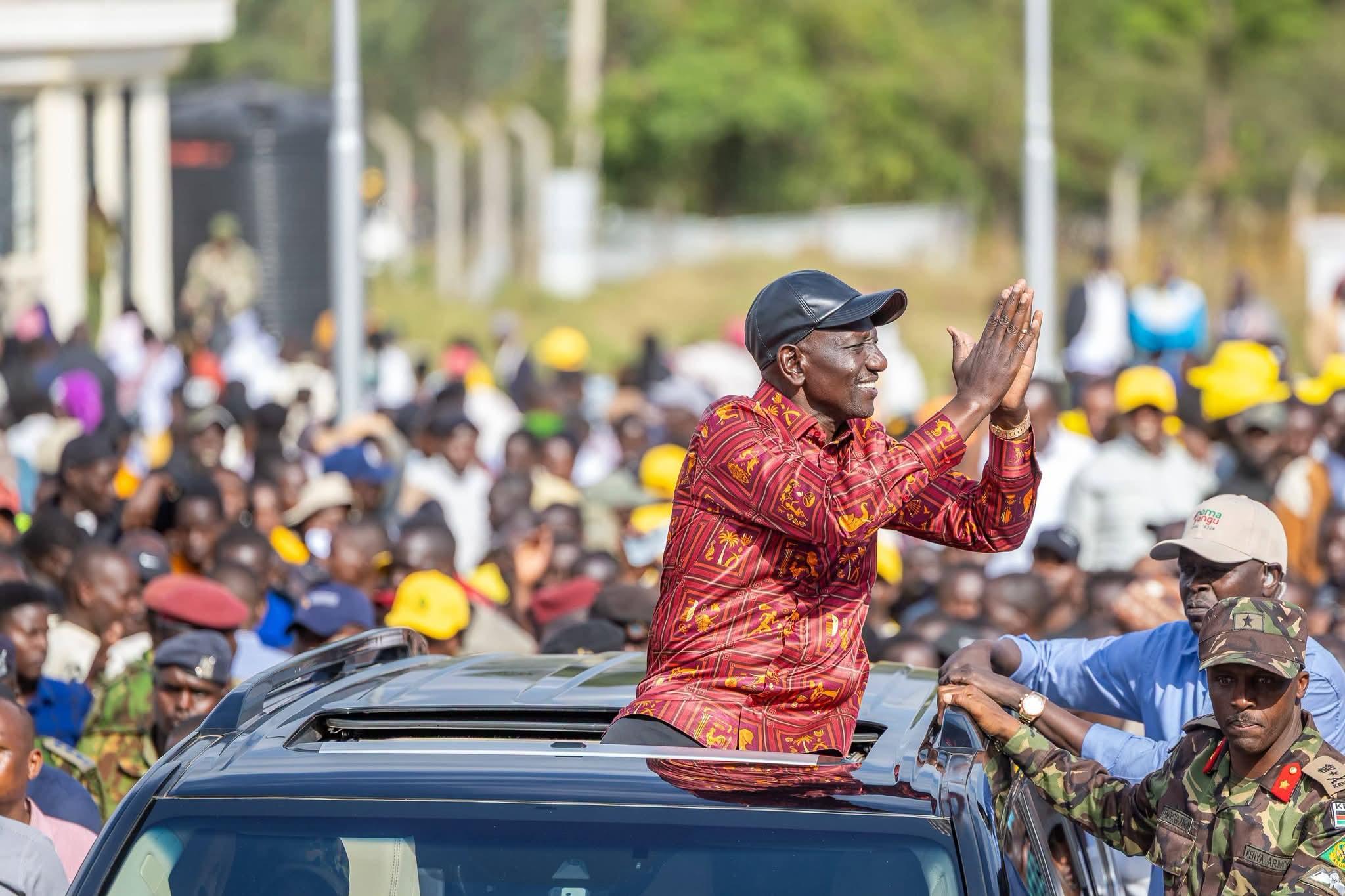 President William Ruto waves to supporters during a public rally in Trans Nzoia County.
