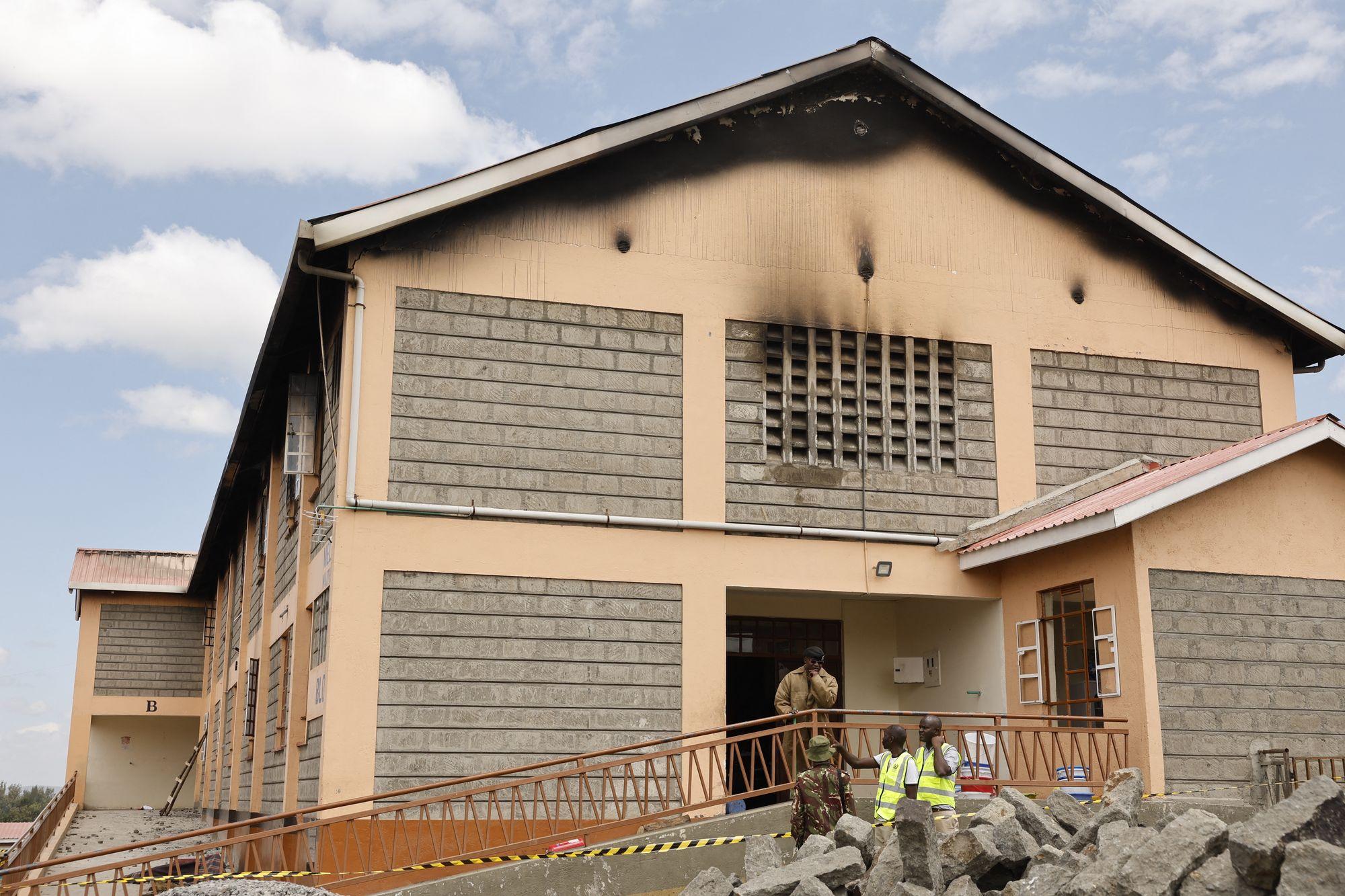 News graphic about the Utumishi Girls School dormitory fire and related court proceedings.