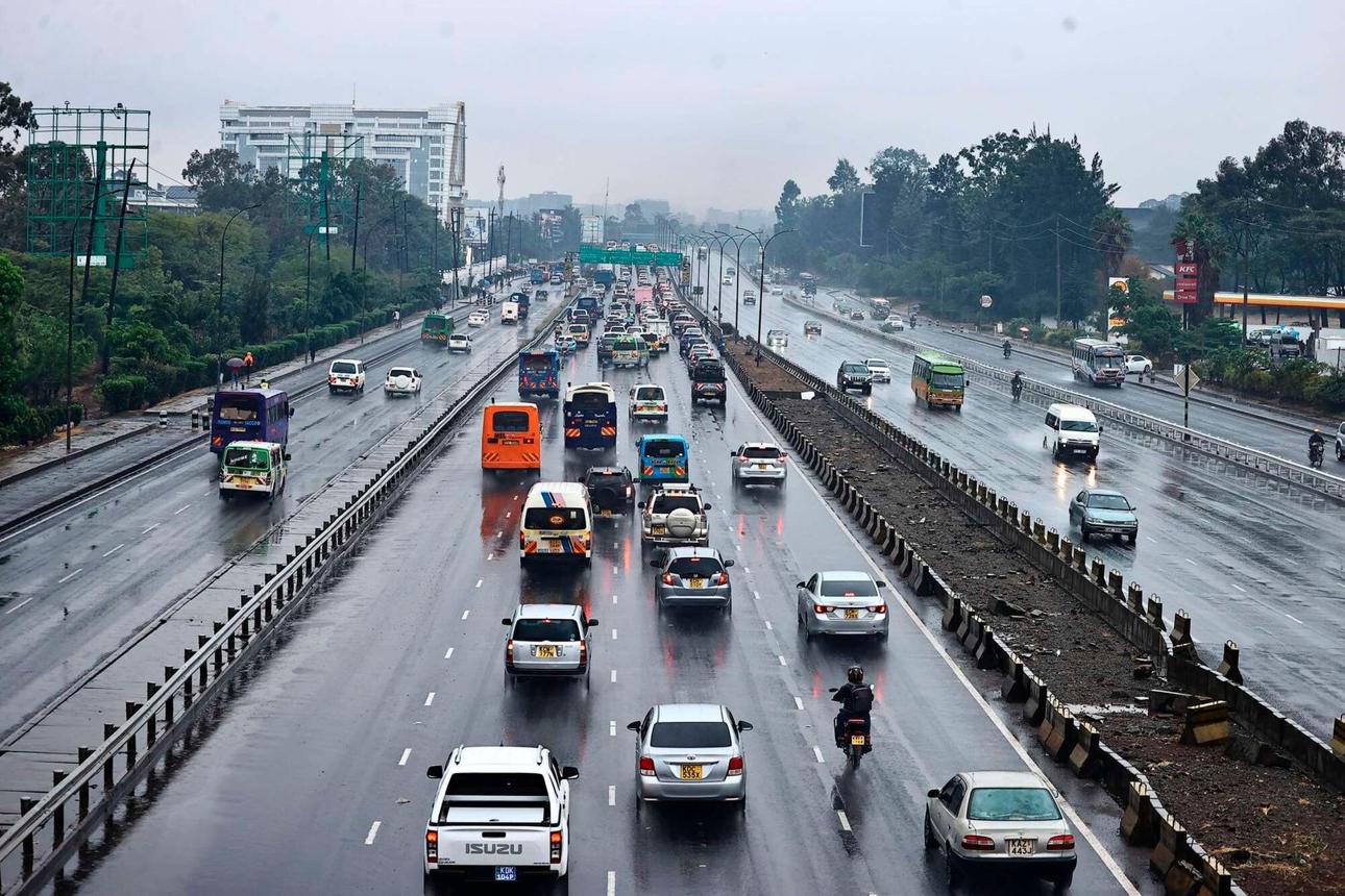 Vehicles travelling along a busy road in the Nairobi-Kiambu corridor.
